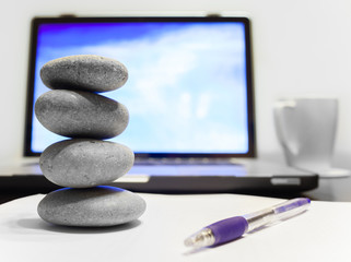 Zen stones on office desk. Break from work concept. 