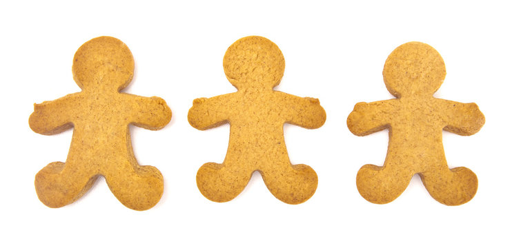 Undecorated Gingerbread People On A White Background