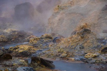 Fototapeta na wymiar One of Iceland's geothermal areas creates an steam-filled, other-worldly scene