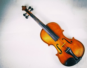 Fototapeta na wymiar The abstract art design background of old violin put on background,prepare for repair