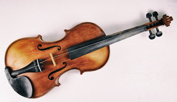 The abstract art design background of old violin put on background,prepare for repair
