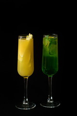 green mojito cocktail and Cocktail italian pear on the dark background
