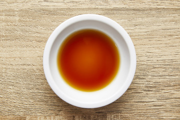 Soy sauce on wooden