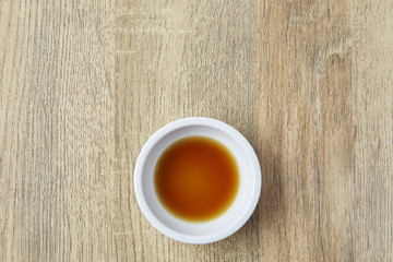 Soy sauce on wooden