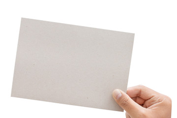 Fototapeta premium Male hand holding gray a blank paper - clipping paths.