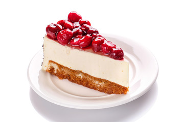 Cake with a cherry, isolated on a white background