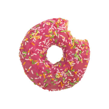 Bitten pink donut with colorful sprinkles isolated on white background.
