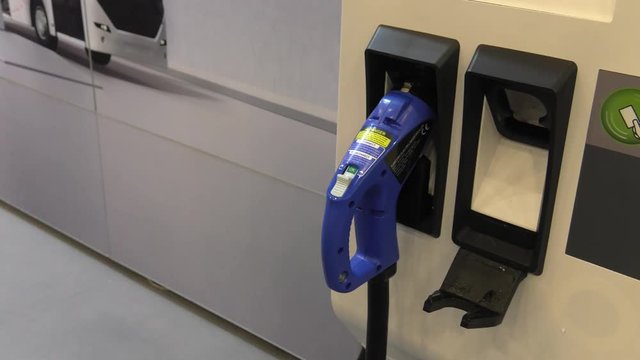 Modern electric vehicle charging station. 4K, UHD, 50p, Cinematic,Closeup, 