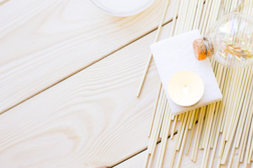 Spa and wellness setting with oil and wheat