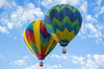 Two colorful hot air balloons