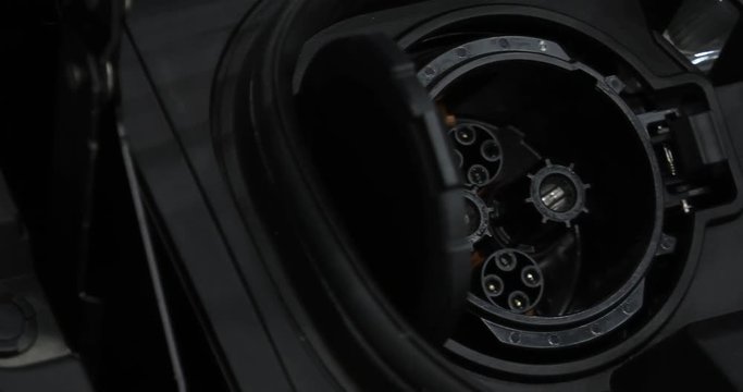 Modern electric vehicle charging station. 4K, UHD, 50p, Cinematic,Closeup, 