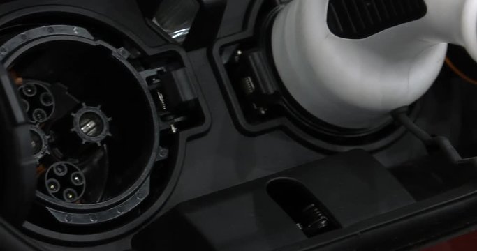 Modern electric vehicle charging station. 4K, UHD, 50p, Cinematic,Closeup, 