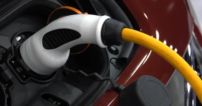 Modern electric vehicle charging station. 4K, UHD, 50p, Cinematic,Closeup, 