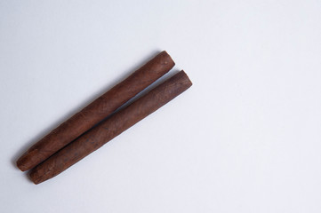 Cuban cigars on white background