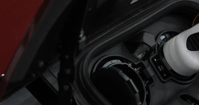 Modern electric vehicle charging station. 4K, UHD, 50p, Cinematic,Closeup, 