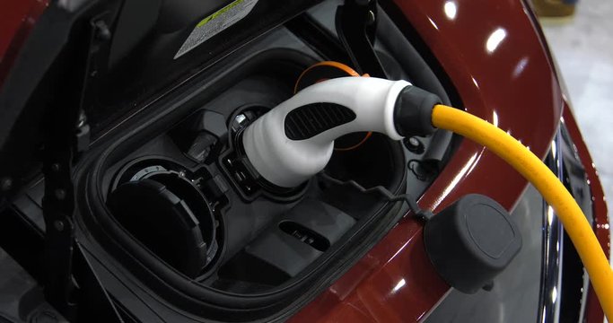 Modern electric vehicle charging station. 4K, UHD, 50p, Cinematic,Closeup, 