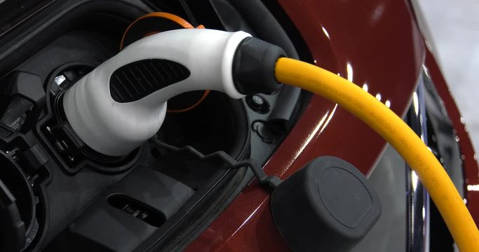 Modern electric vehicle charging station. 4K, UHD, 50p, Cinematic,Closeup, 