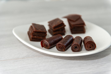 Chewing candy from sweet dough on fruit juice.