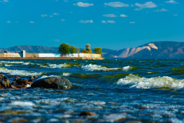 stone in the waves from the river