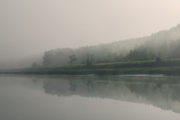 Fototapeta na wymiar Fog over the river and forest,Chusovaya river, Perm, Russia