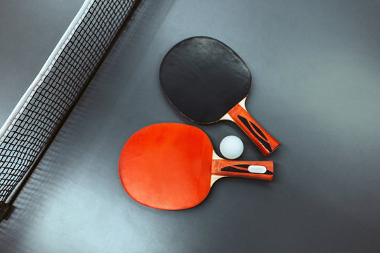 Ping-pong table with rackets and tennis ball