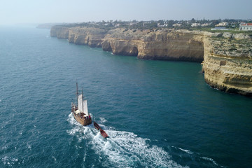 beautiful turquoise ocean water with boat on it top view aerial photo © dima