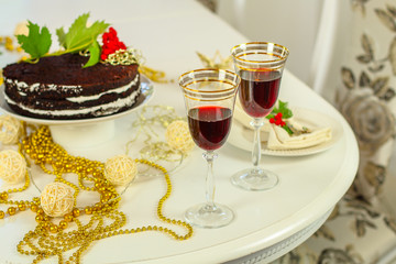 glass of red wine and a cake. Top view. food background copy space
