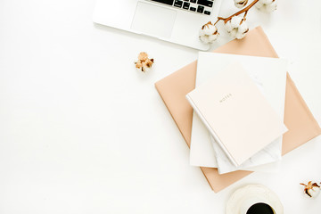 Woman home office desk with laptop, notebook, coffee cup, cotton branch on white background. Flat...