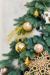Fototapeta na wymiar Holiday background Christmas decoration of a Christmas tree close-up