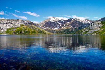 Naklejka na ściany i meble Lake in mountains - Bjønnstokkvatnet in Northern Norway
