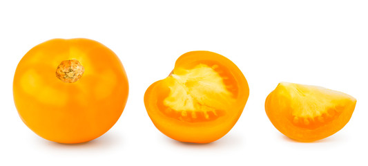 Set of yellow tomatoes whole, half and slice on a white, isolated.