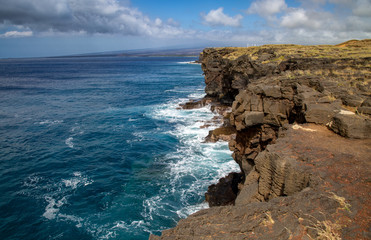 Fototapeta na wymiar Hawiian cliffs and waves