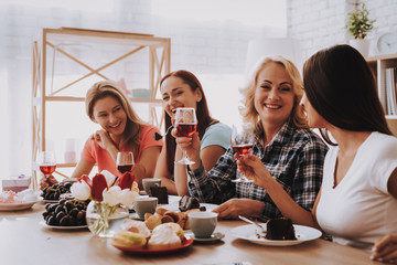 Smile Girl Drinking Wine and Eat Cake. Happy Girl.