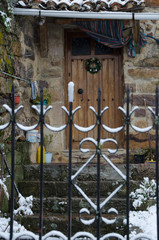 Detail of snow door in typical town of Palencia mountain. Spain.