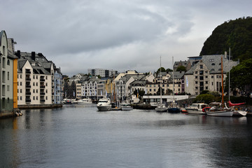 Fototapeta premium View of Alesund town and port, More og Romsdal , on the west coast of Norway, at the entrance to the Geirangerfjord, renowned for its beautiful Art Nouveau buildings.