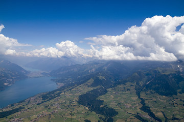 Fototapeta premium Panorama of Lake Thun and the Bernese Alps from Mount Nisen