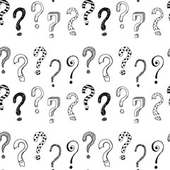 Seamless pattern with hand drawn question marks.