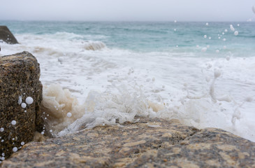 Sea crashing on rocks