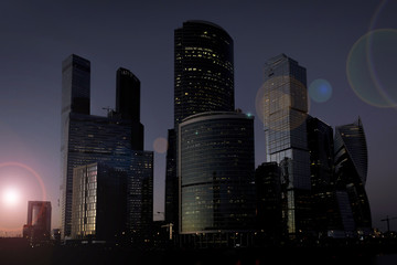 Skyscrapers in the rays of sunset.