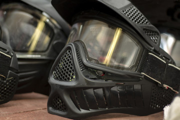 Fototapeta premium Mask, a helmet for a game in a paintball.