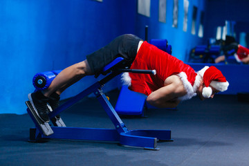 Holidays and celebrations, New year, Christmas, sports, bodybuilding, healthy lifestyle - Muscular...