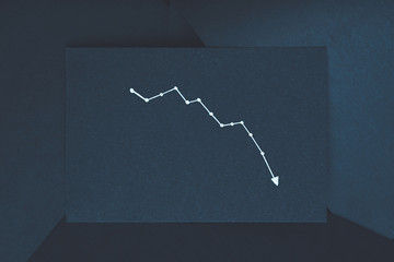 diagram pointing down. decline drop reduction concept. exponential curve on dark blue backdrop.