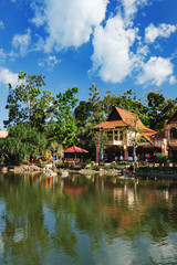 Fototapeta na wymiar Luxury Paradise by the lake, spa home, hotels and shops for tourists at Oriental Village that is the gateway to ride a cable-car up Mat Cingcang mountain