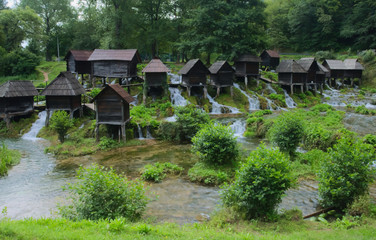 Fototapeta na wymiar A mill complex on Pliva lakes (Malo and Veliko Plivsko Jezero) near Jajce, Bosnia and Herzegovina.