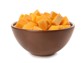 Bowl with fresh raw pumpkin pieces isolated on white