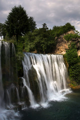 Naklejka premium A detailed view at Pliva waterfall (Plivski vodopad) located in the city center of Jajce, Bosnia and Herzegovina.