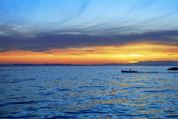 Izmir, Turkey, 30 March 2010: Sunset of Karsiyaka