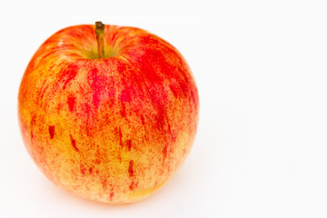 bright ripe juicy apple isolated on white background. healthy diet nutrition wallpaper.
