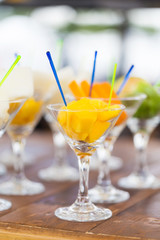 Cuts of fruits in glasses for party