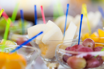 Cuts of fruits in glasses for party